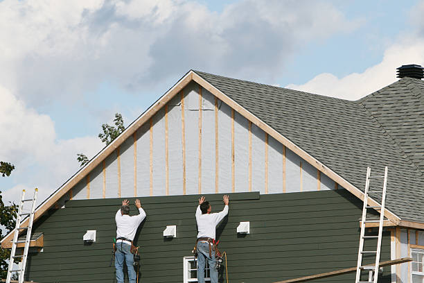 Professional Siding technician working in Delmont, PA